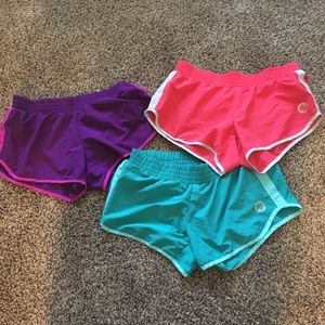 Set of three running shorts.